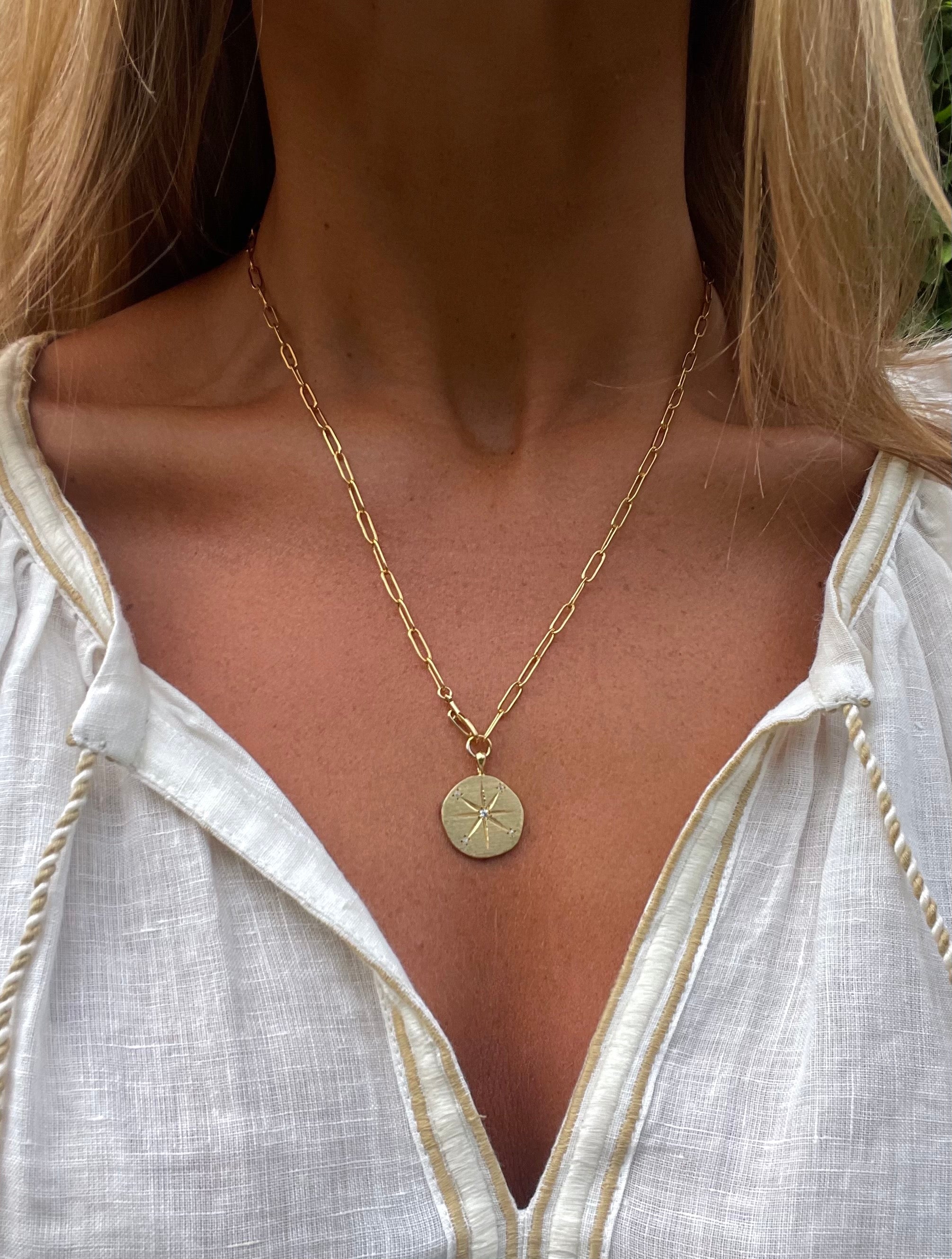 gold link chain necklace with sun medallion the falcon necklace neo medallion hanka in